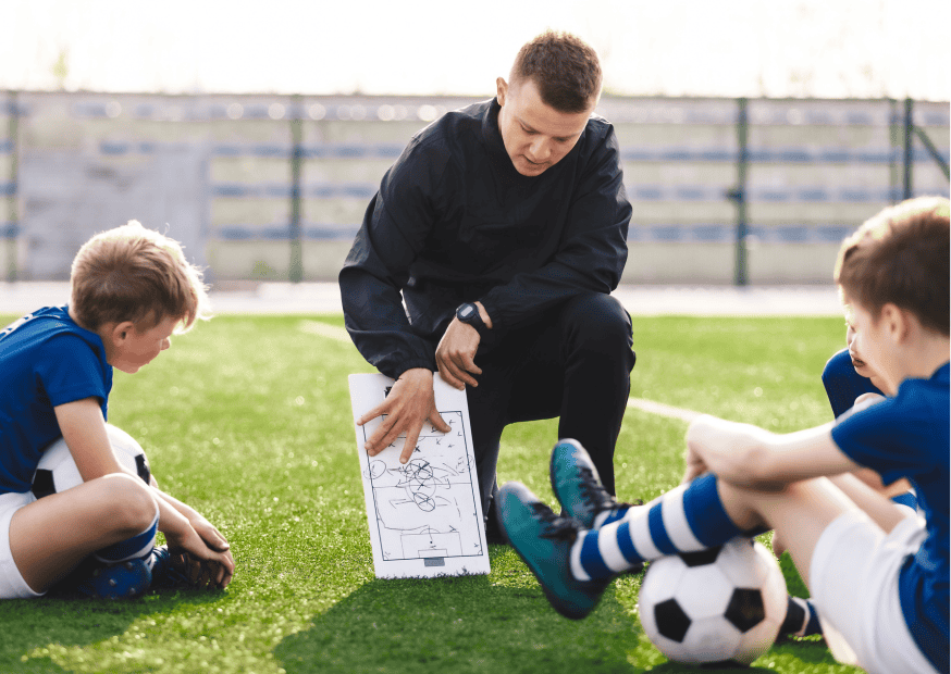 manny leading a group activity with children